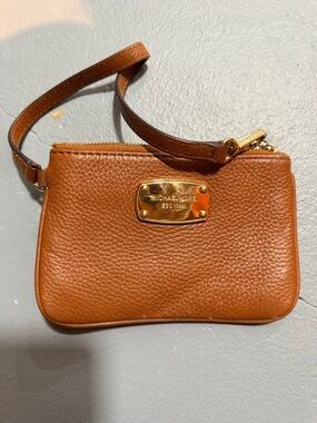 Michael Kors Cognac Pebbled Leather Wristlet with Gold Plaque